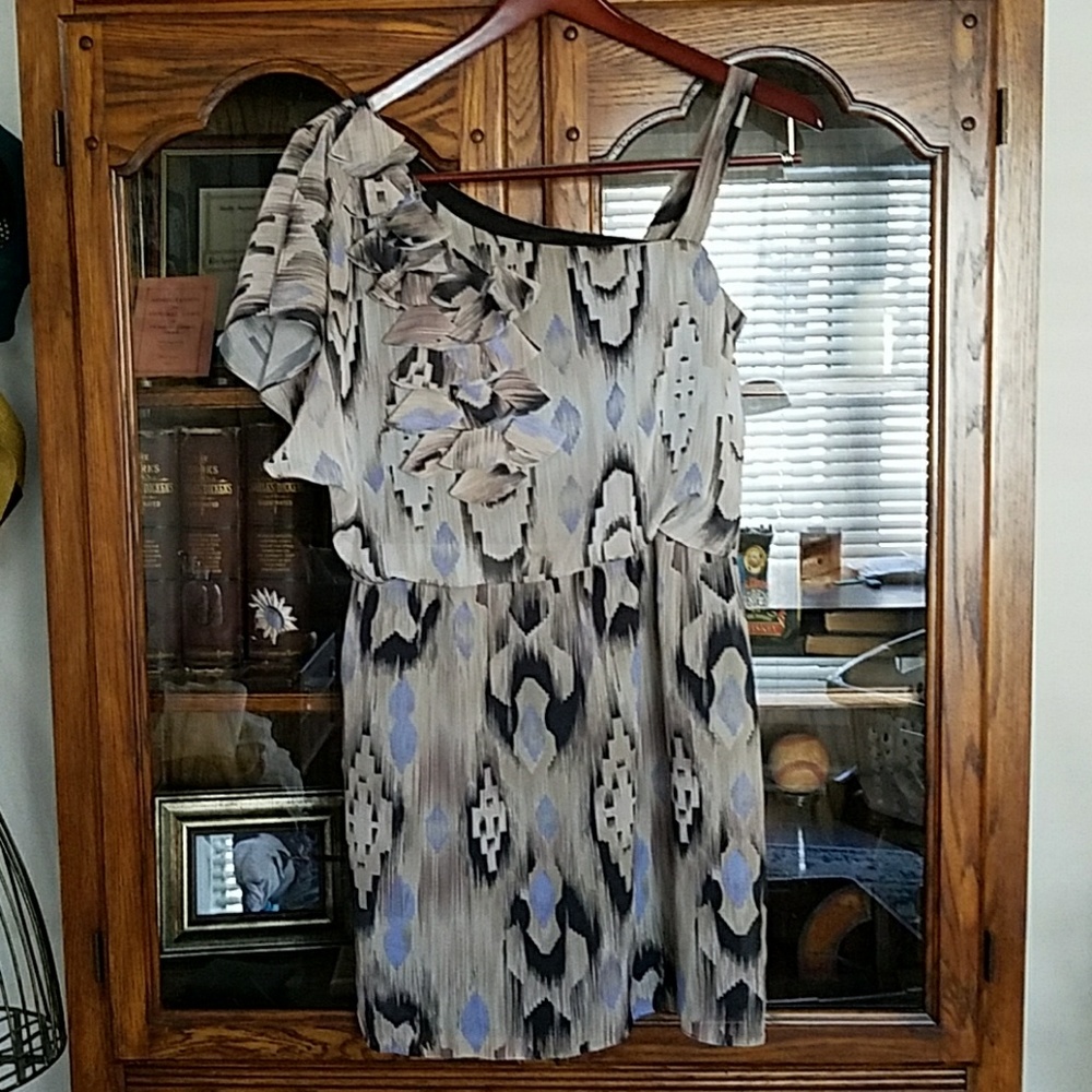 Free flowing flutter sleeve and strap dress.